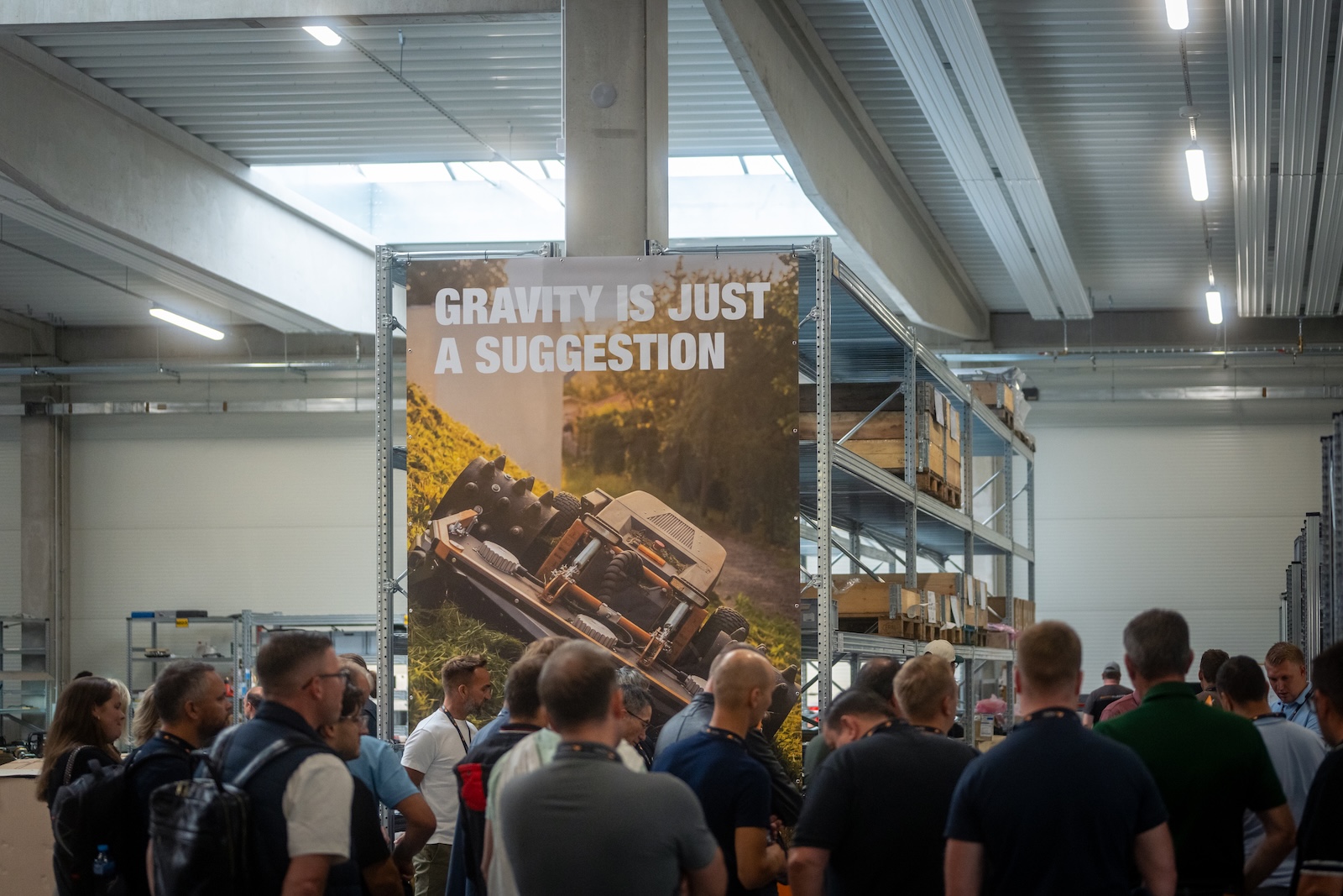 Gravity is just a suggestion banner above the crowd in the hall