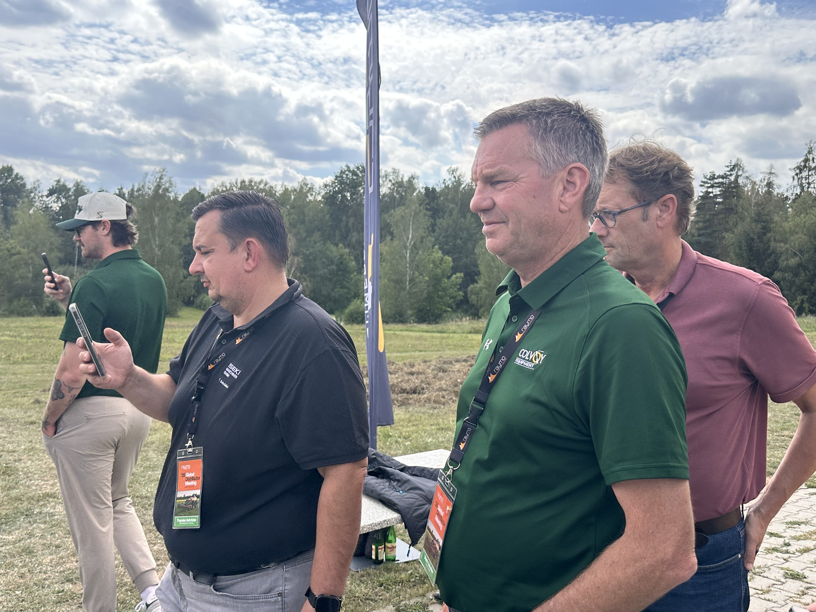 Distributors talking during the outdoor demo event