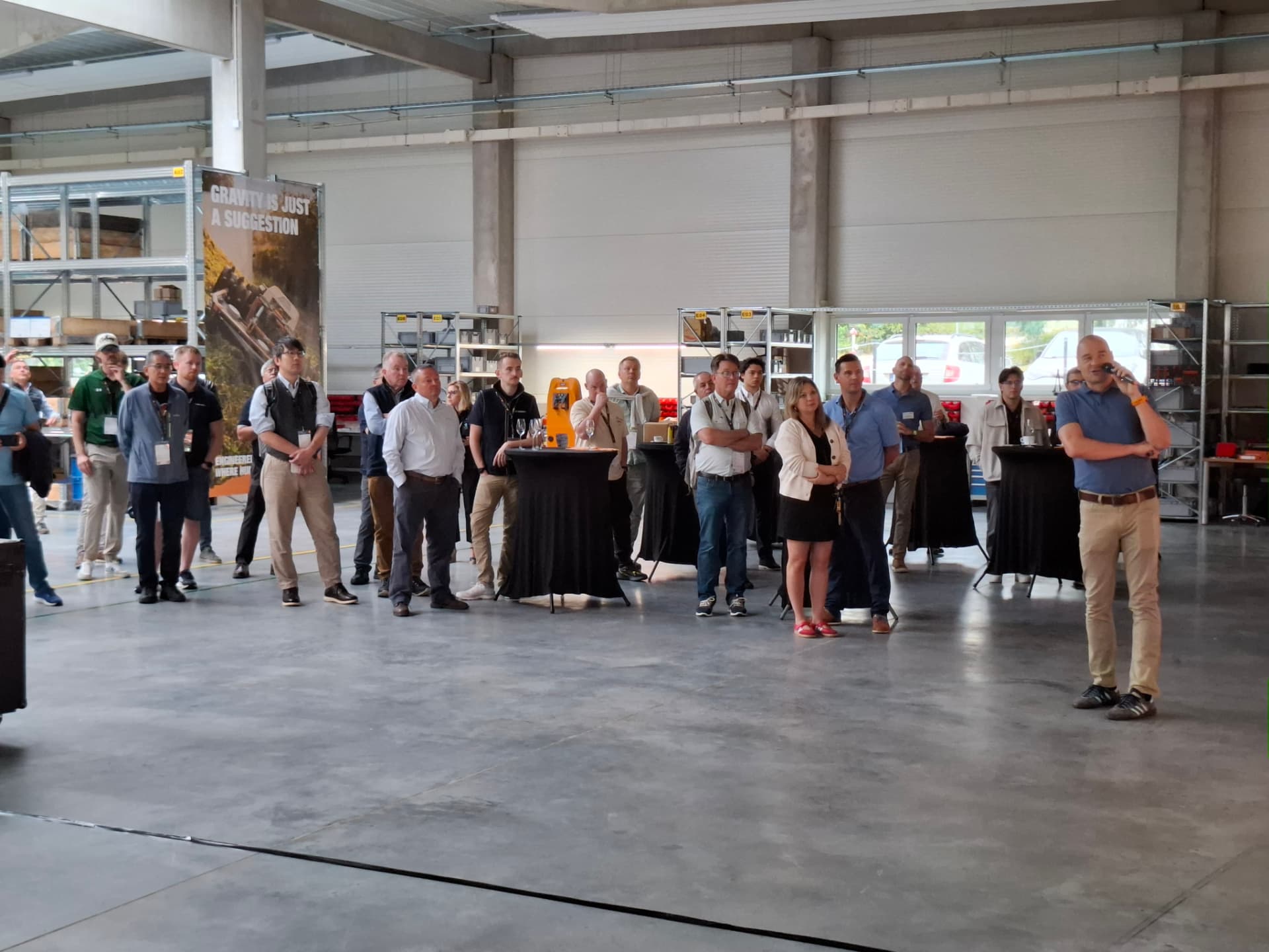 Speaker addressing the distributors in the hall