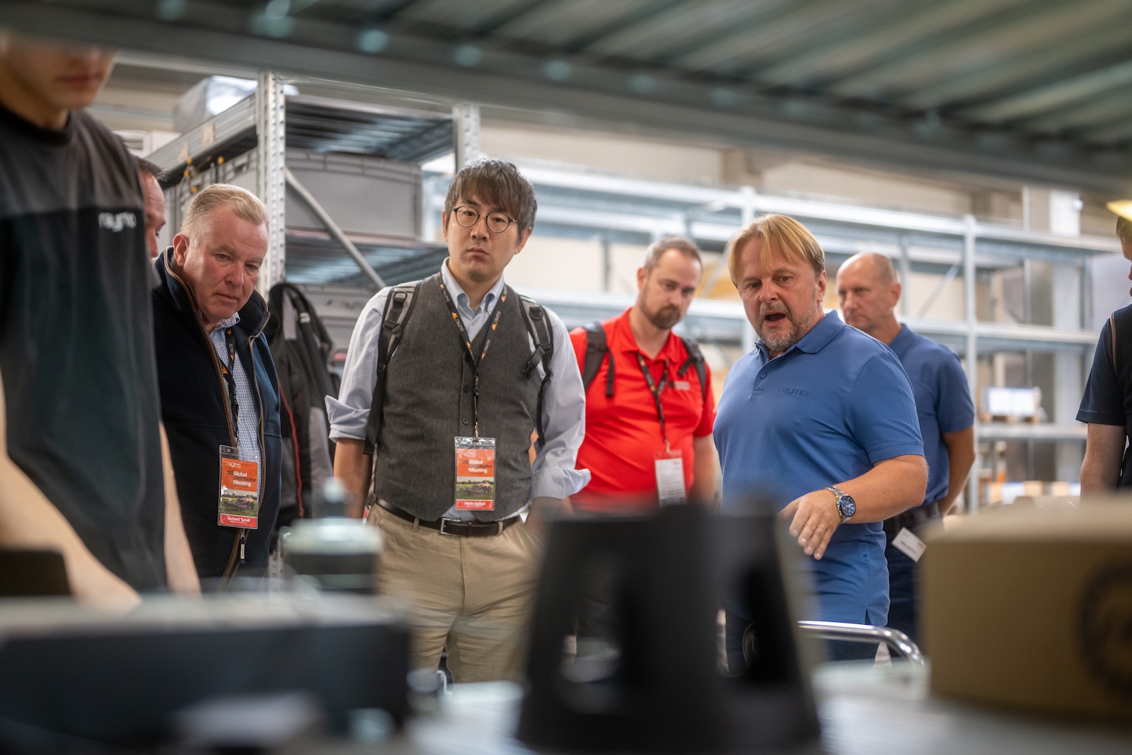 Raymo specialist explaining components to international guests